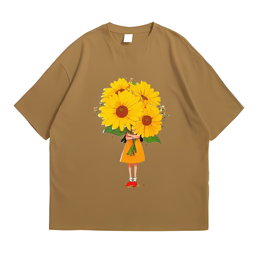 A little girl holding a sunflower